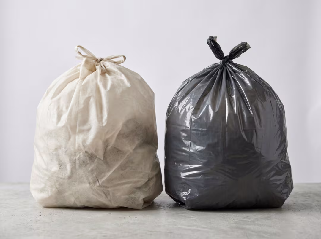 Close up of compostable and plastic bag materials Close up of compostable and plastic bag materials